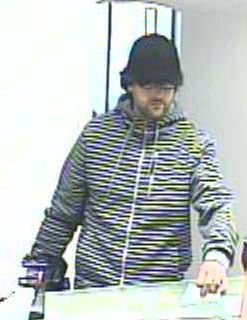 Pachatel loupeže - rok 2013 - banka v Kadani