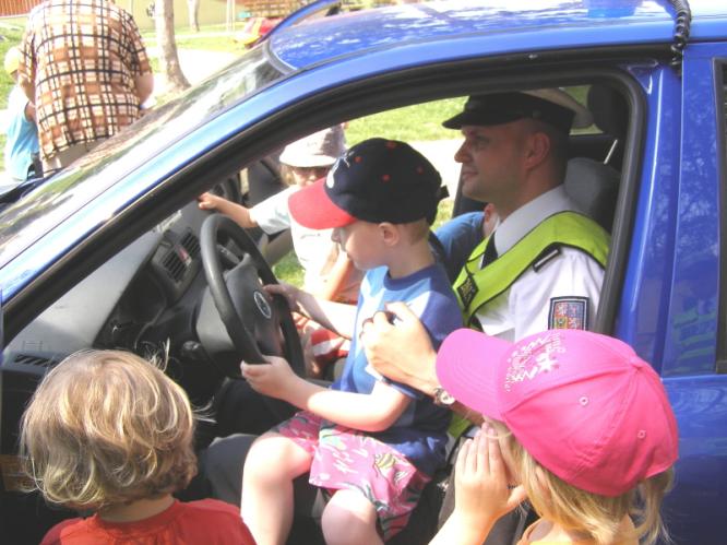 V policejním autě
