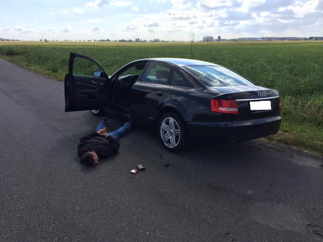 pachatel po zadržení