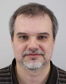 ADAM VLČEK